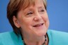 Outgoing German Chancellor Angela Merkel Congratulates Olaf Scholz on His Election Win