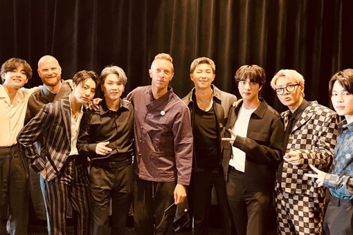 BTS and Coldplay pose for a picture