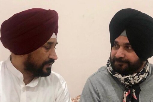 Punjab Congress president Navjot Singh Sidhu (R) with party's CM face Charanjit Singh Channi. (Image: News18/File)