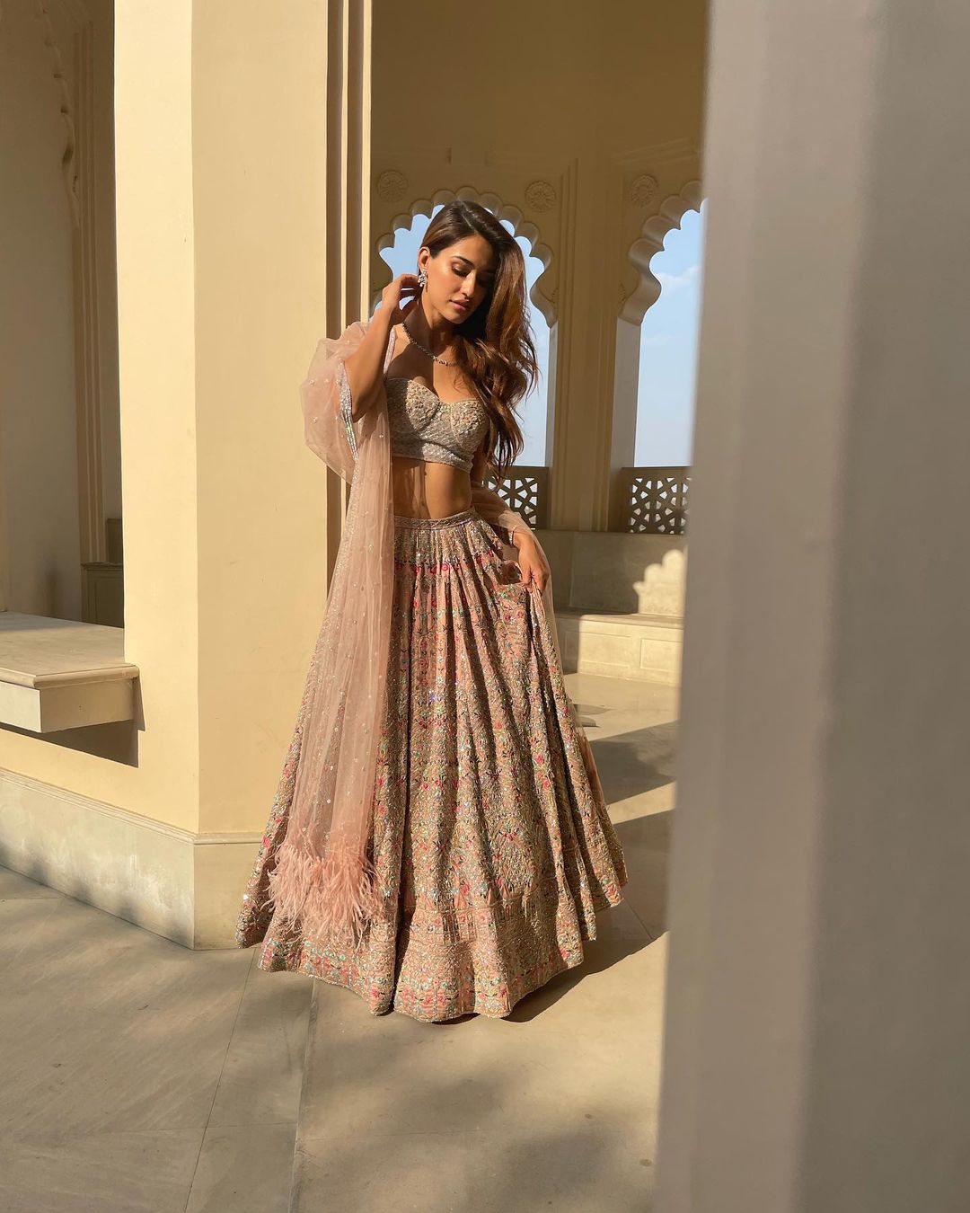 Disha Patani looks elegant in the embroidered lehenga. 