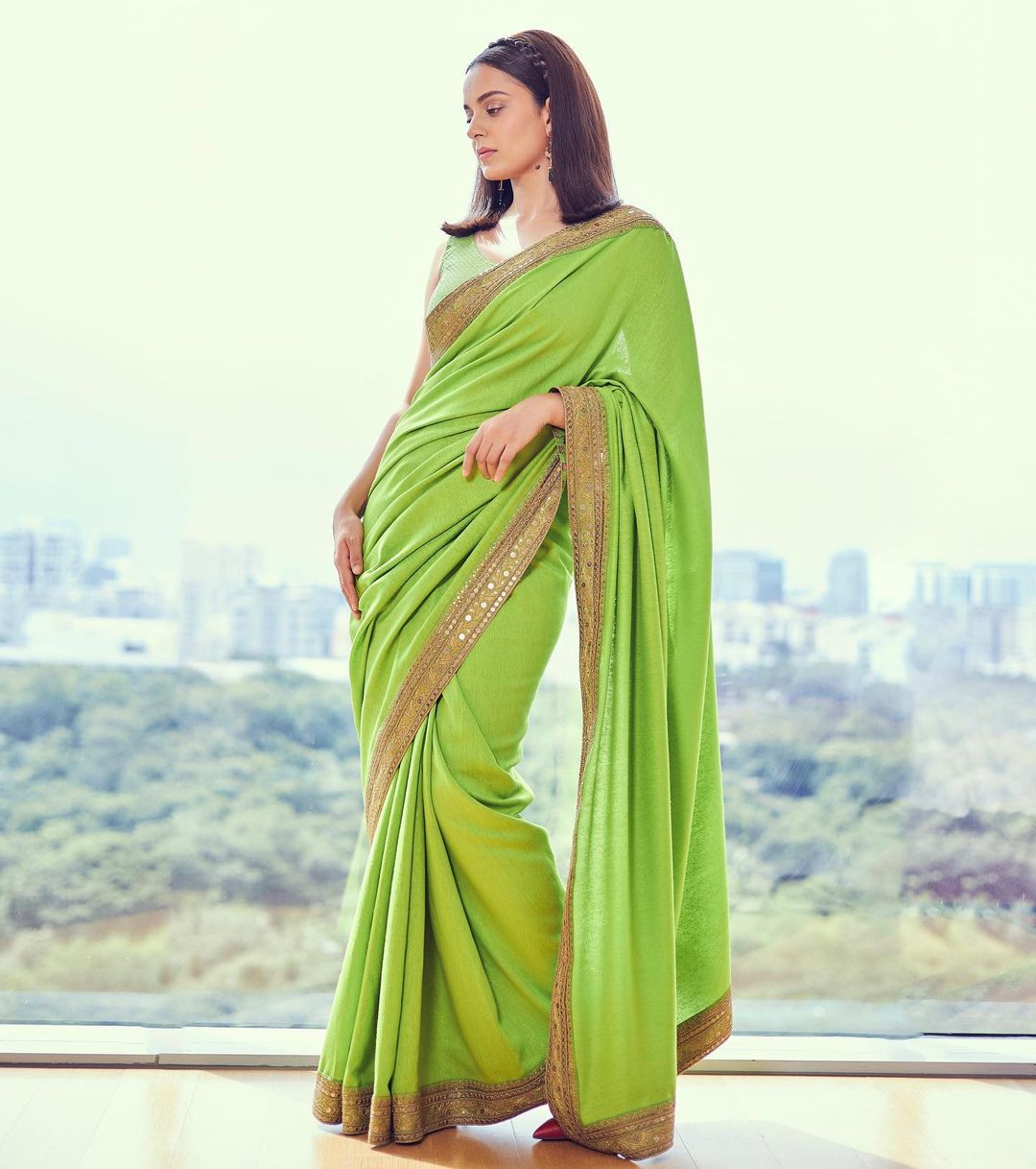 Kangana Ranaut is elegance personified in the green saree.