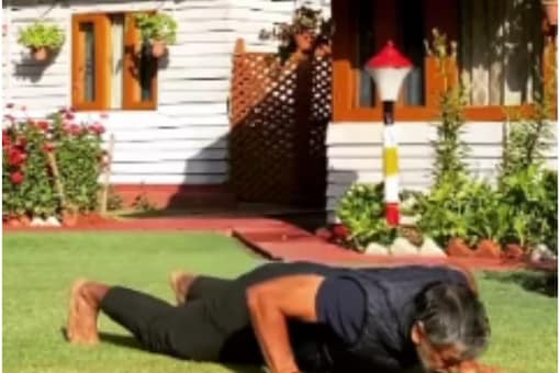 In a video, Milind Soman is seen doing workouts.
