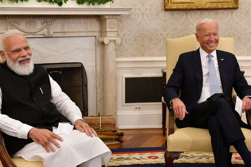 Prime Minister Narendra Modi and US President Joe Biden share a laugh during a bilateral meeting at the Oval Office in Washington DC on Thursday. (Image: @PMO India/Twitter) 