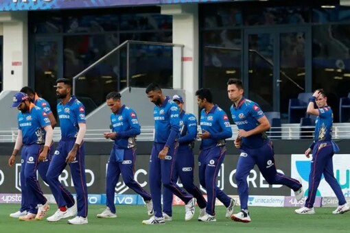Mumbai Indians players step out onto the field (BCCI Photo)