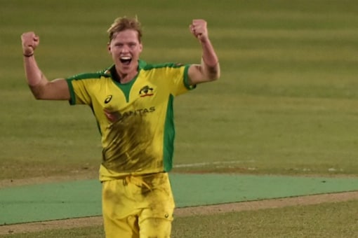 Nathan Ellis celebrates after taking a wicket during the third Twenty20I between Bangladesh and Australia (AFP)