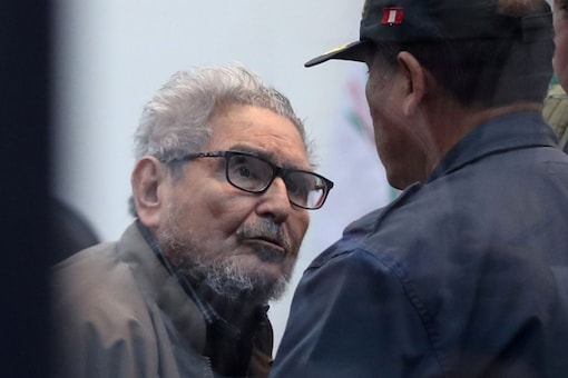 FILE PHOTO: Shining Path founder Abimael Guzman attends a trial during sentence of a 1992 Shining Path car bomb case in Miraflores, at a high security naval prison in Callao, Peru September 11, 2018. REUTERS/Mariana Bazo
