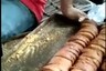 Factory Workers Lick, Step on Rusks Before Packing Them in Shocking Video