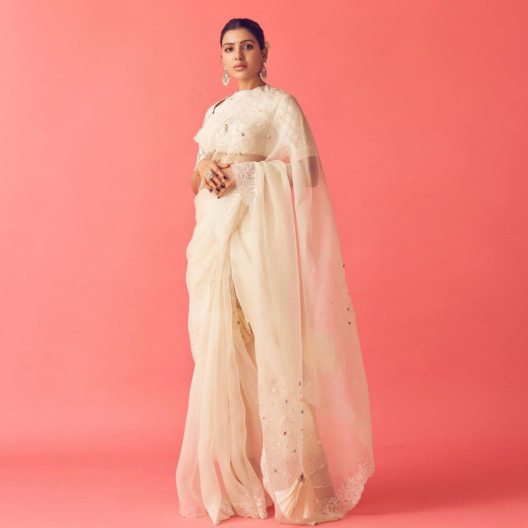 Samantha Akkineni looks elegant in the pristine white saree. 