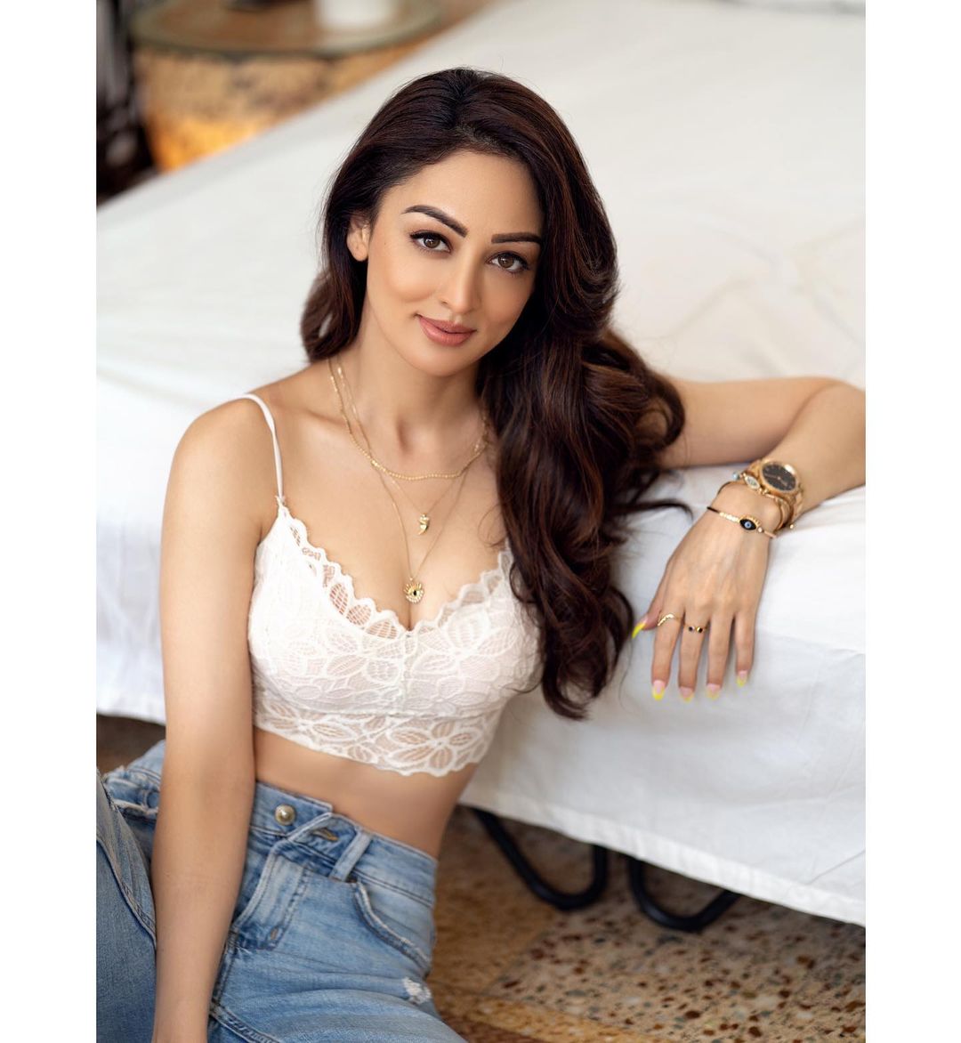 Sandeepa Dhar looks elegant in the white lace bralette with denims.