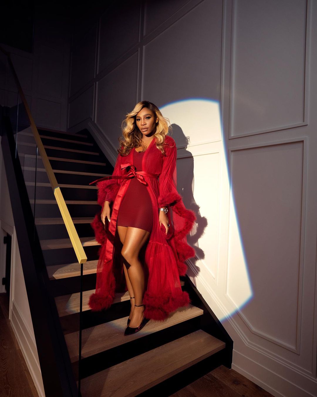 The athlete makes our hearts skip a beat in this crimson red dress paired with a flowy red robe. Serena knows how to rock a monochrome look. (Image: Instagram) The athlete makes our hearts skip a beat in this crimson red dress paired with a flowy red robe. Serena knows how to rock a monochrome look. (Image: Instagram)