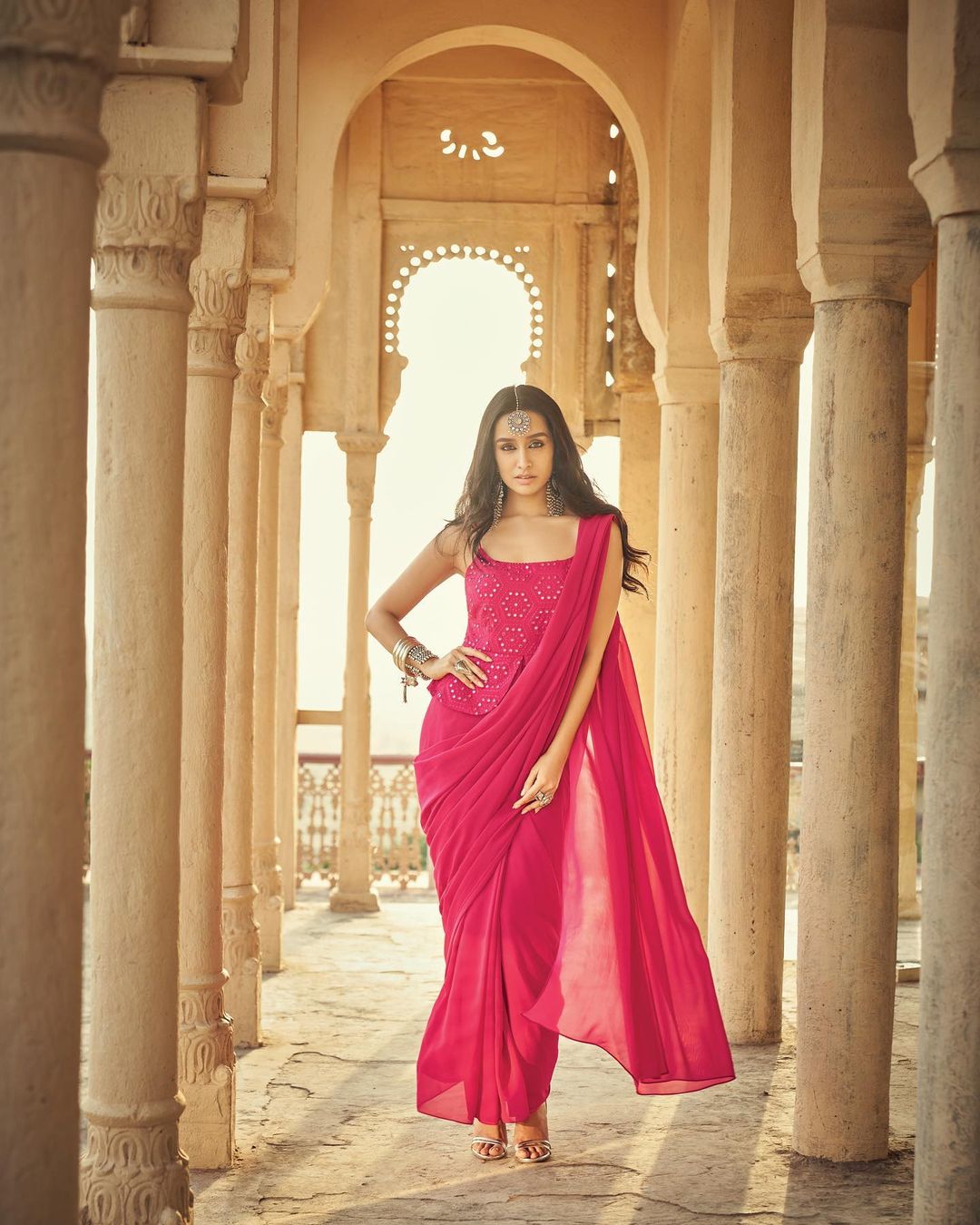 Shraddha Kapoor looks a vision in the pink plain saree.