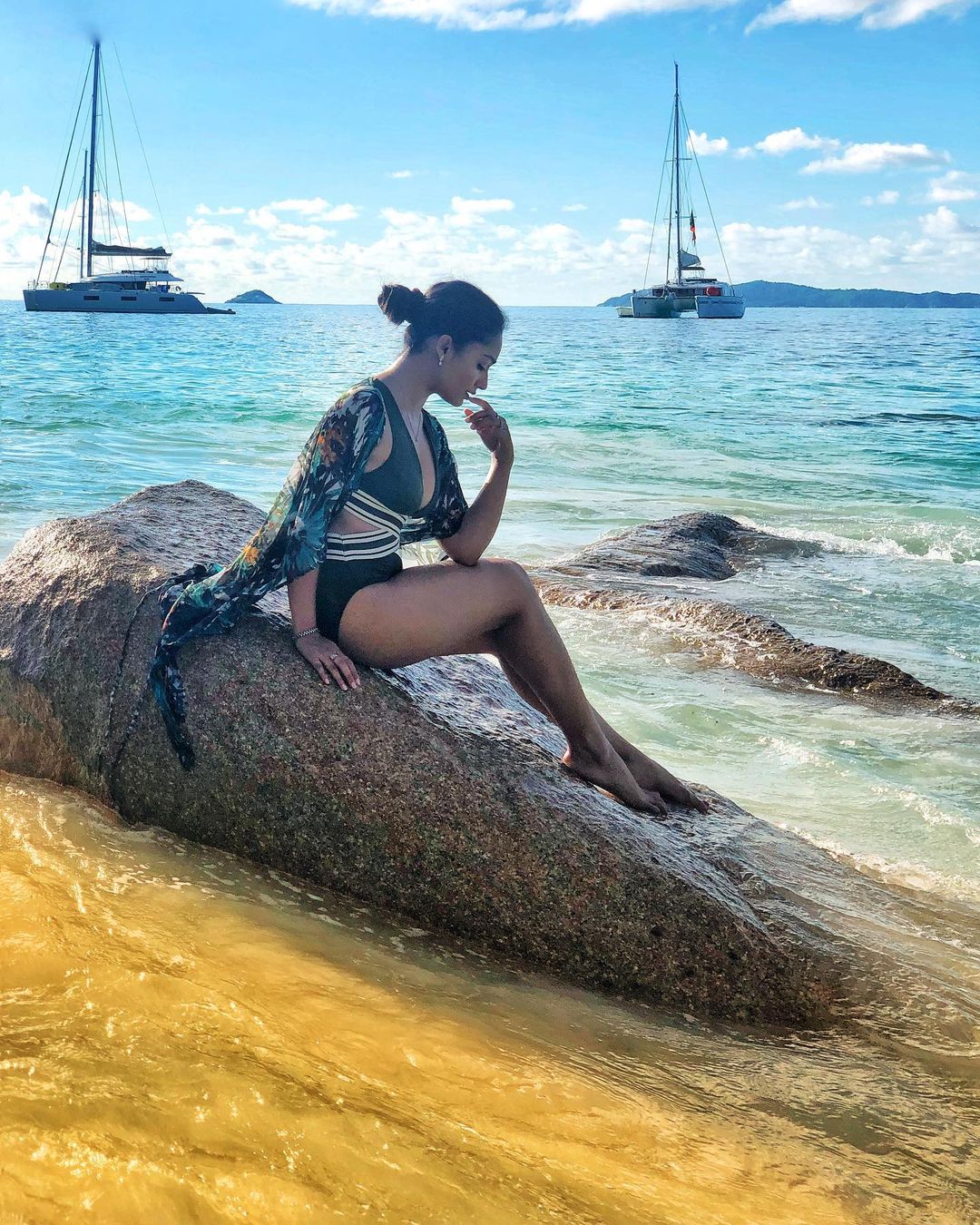 Tridha Choudhury looks seductive in the oceanside view.