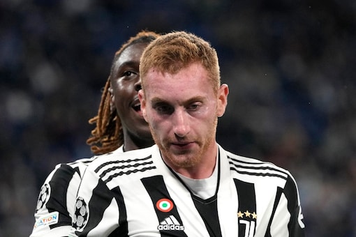 Juventus' Dejan Kulusevski reacts after scoring his side's opening goal during the Champions League group H soccer match between Zenit St. Petersburg and Juventus at the Gazprom Arena in St.Petersburg, Russia, Wednesday, Oct. 20, 2021. (AP Photo/Dmitry Lovetsky)