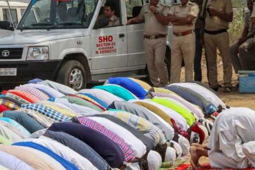 Namaz being offered amid police security in Gurugram. (Photo: PTI File)