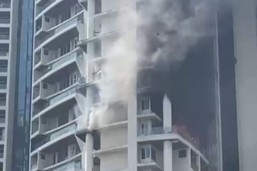 A fire on the 19th floor of Avighna Park Tower in Mumbai, on Friday. (Image: News18/Video grab) 
