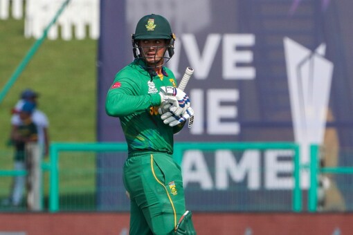 South Africa's Quinton de Kock walks from the field after he was dismissed during the Cricket Twenty20 World Cup match between South Africa and Australia in Abu Dhabi, UAE, Saturday, Oct. 23, 2021. (AP Photo/Kamran Jebreili )