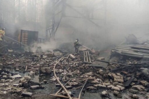 The emergencies ministry published images showing smoke and debris at the severely damaged factory building. (Image credits: Via AFP)