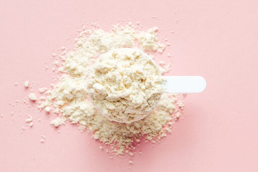 Dry scooping involves a person swallowing pre-workout or fitness related powder dry, chasing it with a little sip of water or liquid (Image: Shutterstock)