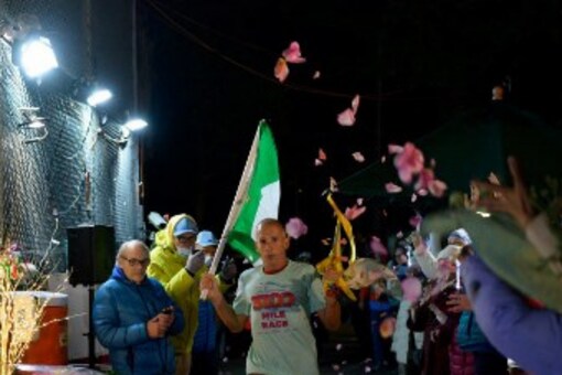 Andrea Marcato of Italy crosses the line to win the 'Self-Transcendence 3100 Mile Race', the world's longest certified foot race,(AFP)
