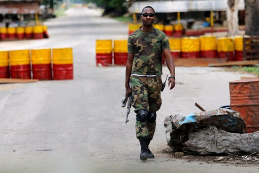 A soldier walks past a checkpoint in Bama, Borno State, Nigeria, August 31, 2016. REUTERS/Afolabi Sotunde
