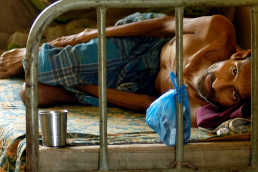 A patient suffering from Tuberculosis rests inside a hospital in Agartala, capital of India's northeastern state of Tripura. (Reuters)
