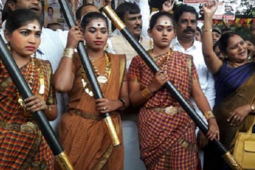 
Members of Veera Vanite Onake Obavva Horata Vedike with people dressed as Onake Obavva soldiers holding a protest against the celebration of Tippu Sultan's birth anniversary, in Bengaluru, in 2017. (File photo: PTI)