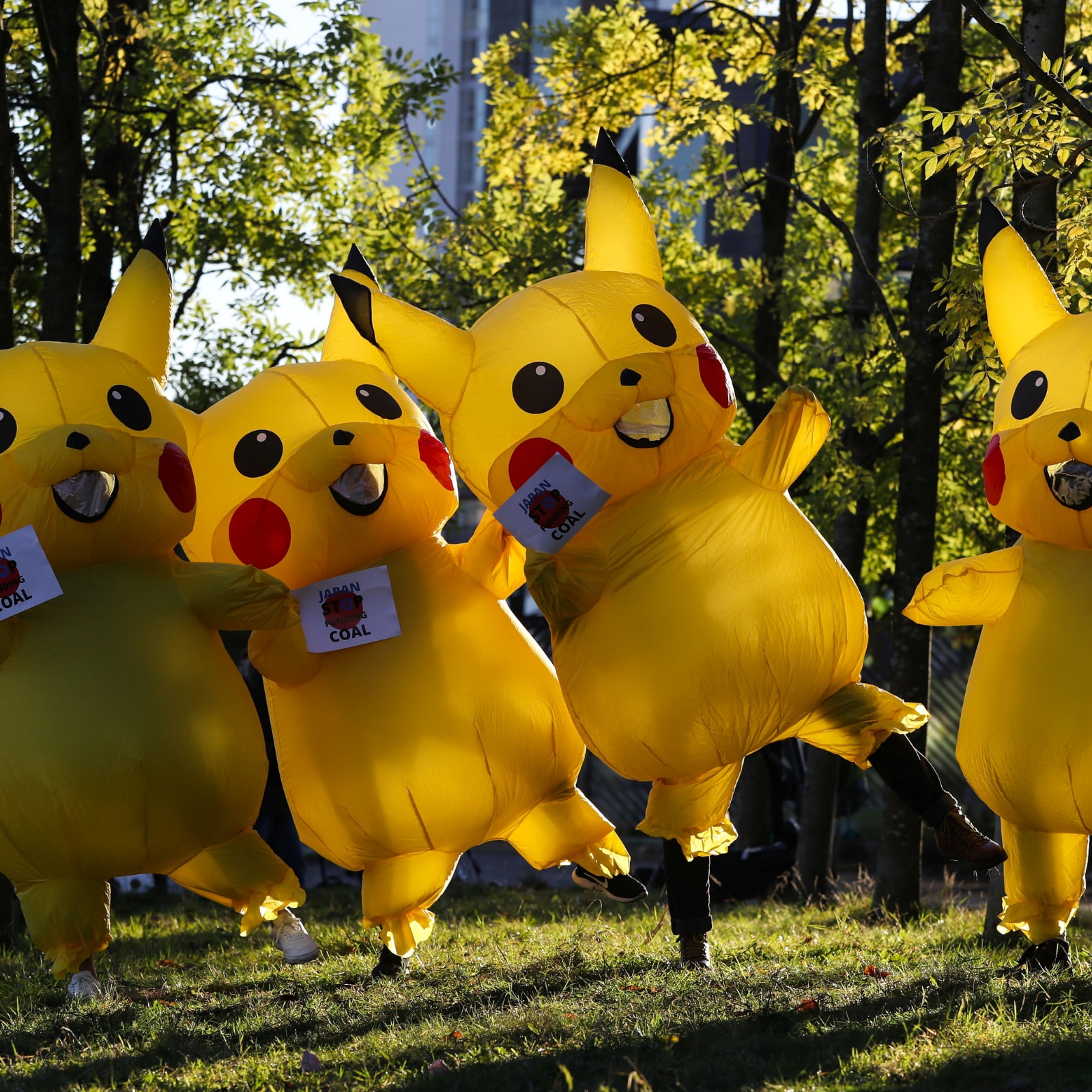 Giant 'Pikachu' Protesters Hit Glasgow Streets Demanding End to Coal Power Giant 'Pikachu' Protesters Hit Glasgow Streets Demanding End to Coal Power