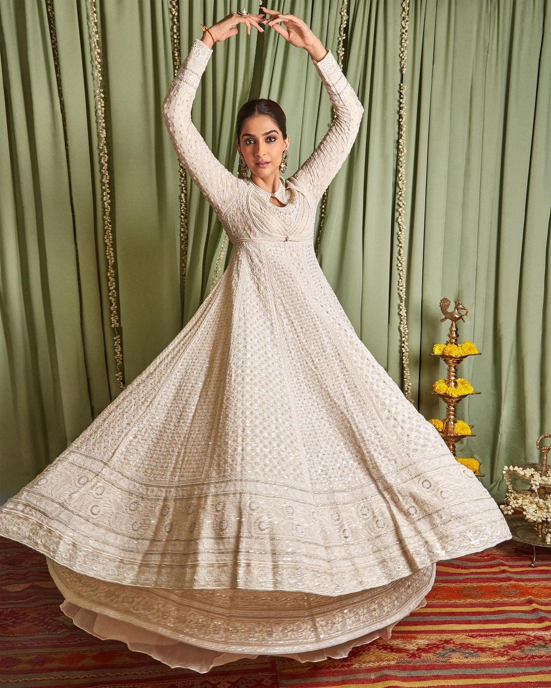 Sonam Kapoor is sophistication personified in sheer white ruffle dress |  TOIPhotogallery