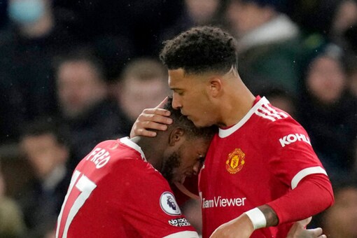Manchester United's Fred and Jadon Sancho (AP)