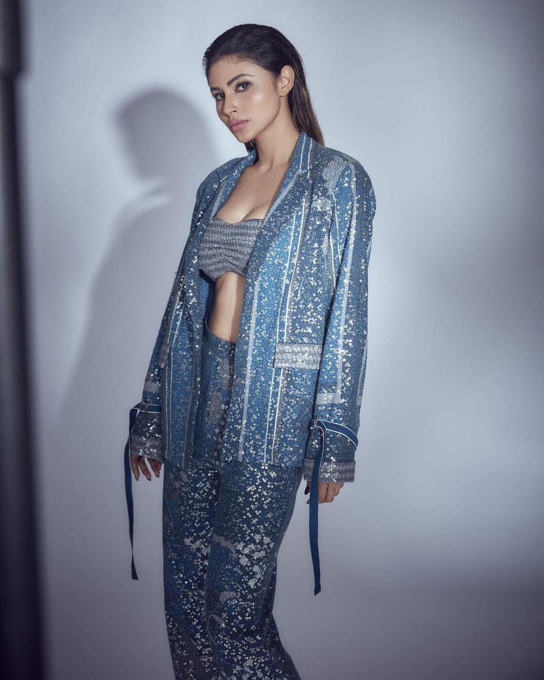 Indigo Elegance and Sequinned Glamour: Mouni Roy Stuns in a Bralette and Pantsuit