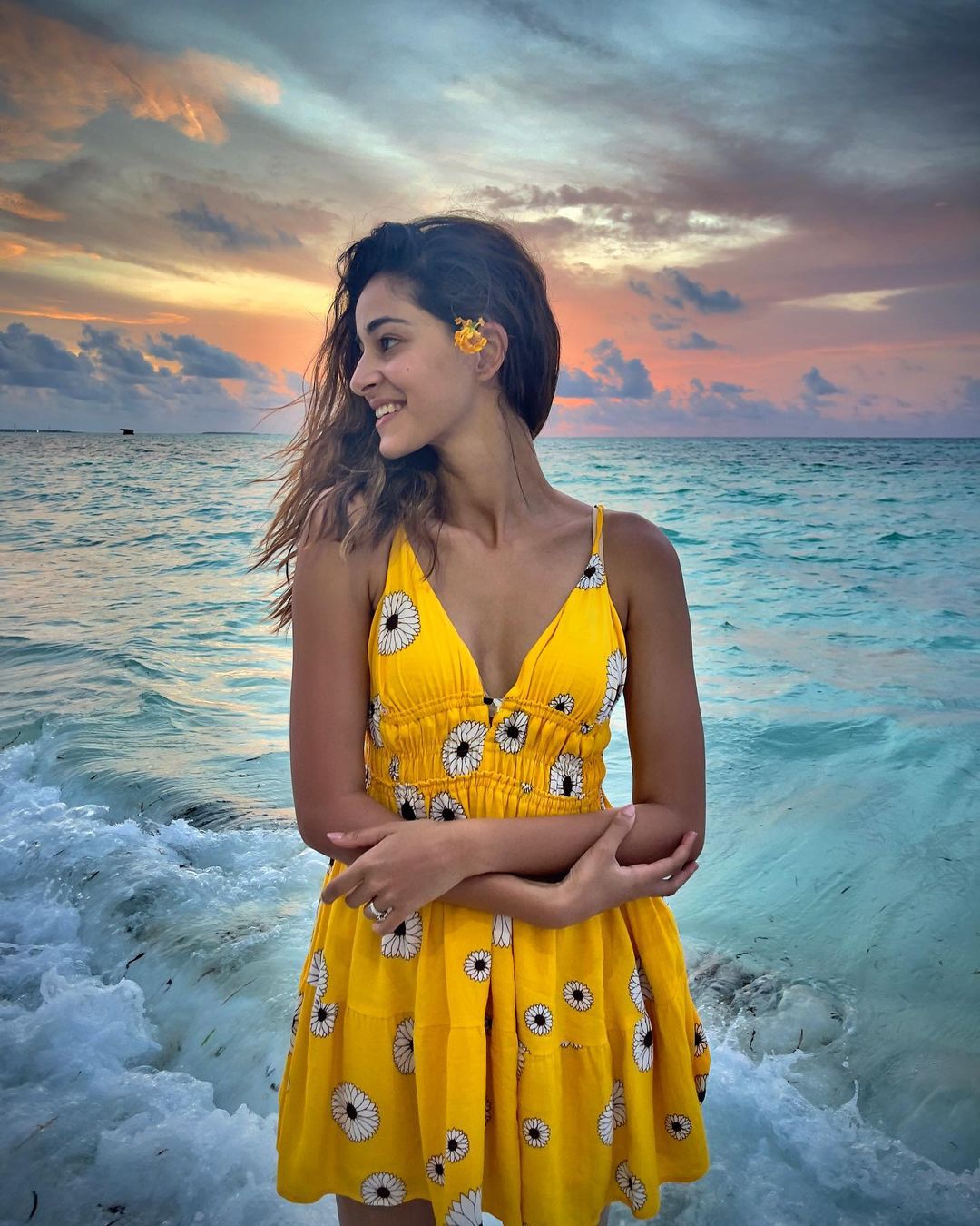 Be the sunshine of the party in a bright yellow dress with floral prints. Image: Instagram