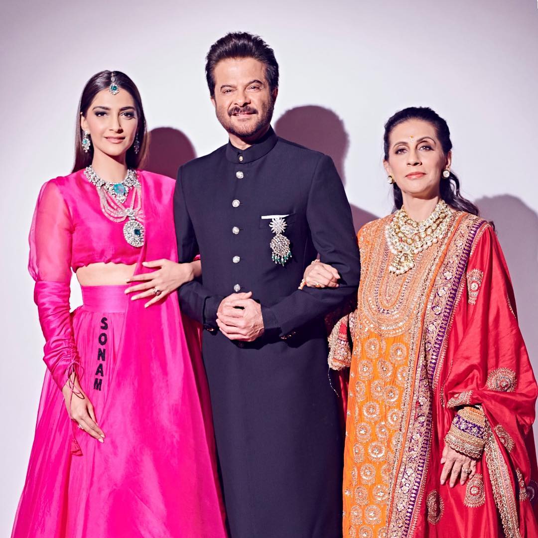 The actor certainly knows how to ace traditional fashion. Flanked by his wife and eldest daughter Sonam, Anil shared a festive picture on Instagram. (Image: Instagram)