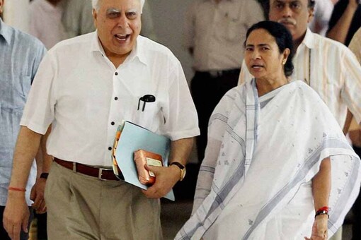 File photo of Kapil Sibal and Mamata Banerjee. (PTI)