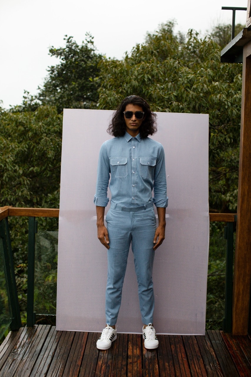 You can never go wrong with a denim outfit. Thrown on a ice blue soft denim co-ord set with defined pockets designed by label Nirmooha