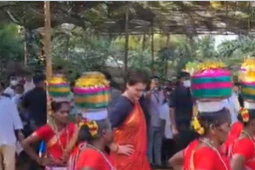 Priyanka Gandhi Vadra joins the tribal women of Morpirla village during a phenomenal performance of their folk dance. Credits: Congress/Twitter.