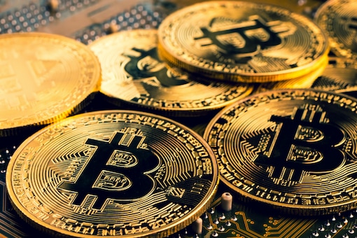 Bitcoin's rise in 2021 coincided with Wall Street's growing appetite for cryptocurrency. (Image Credits: Shutterstock)