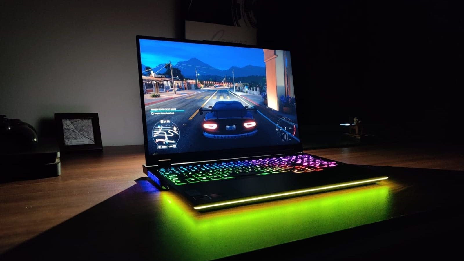 This image shows the Lenovo Legion 7 2022 in lightning on the table.