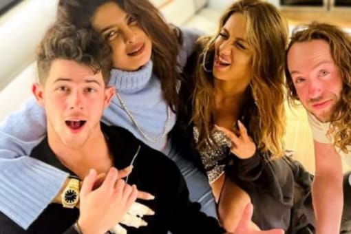 Natasha Poonawalla with Priyanka Chopra and Nick Jonas 