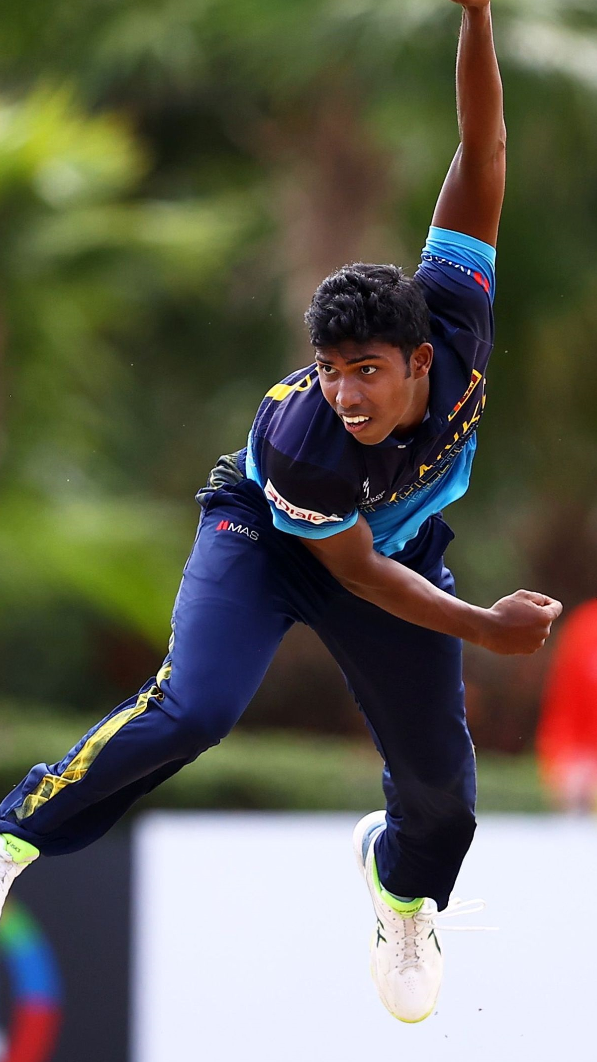 Vinuja Ranpul of Sri Lanka in bowling action during the ICC U19 Men's Cricket World Cup match between Sri Lanka and Afghanistan at Coolidge Cricket Ground on January 27, 2022 in Antigua. (Pic Credit: ICC) Vinuja Ranpul of Sri Lanka in bowling action