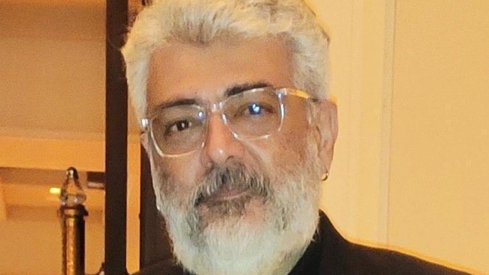 ajith-kumar-s-new-look-featuring-white-hair-ear-piercing-goes-viral