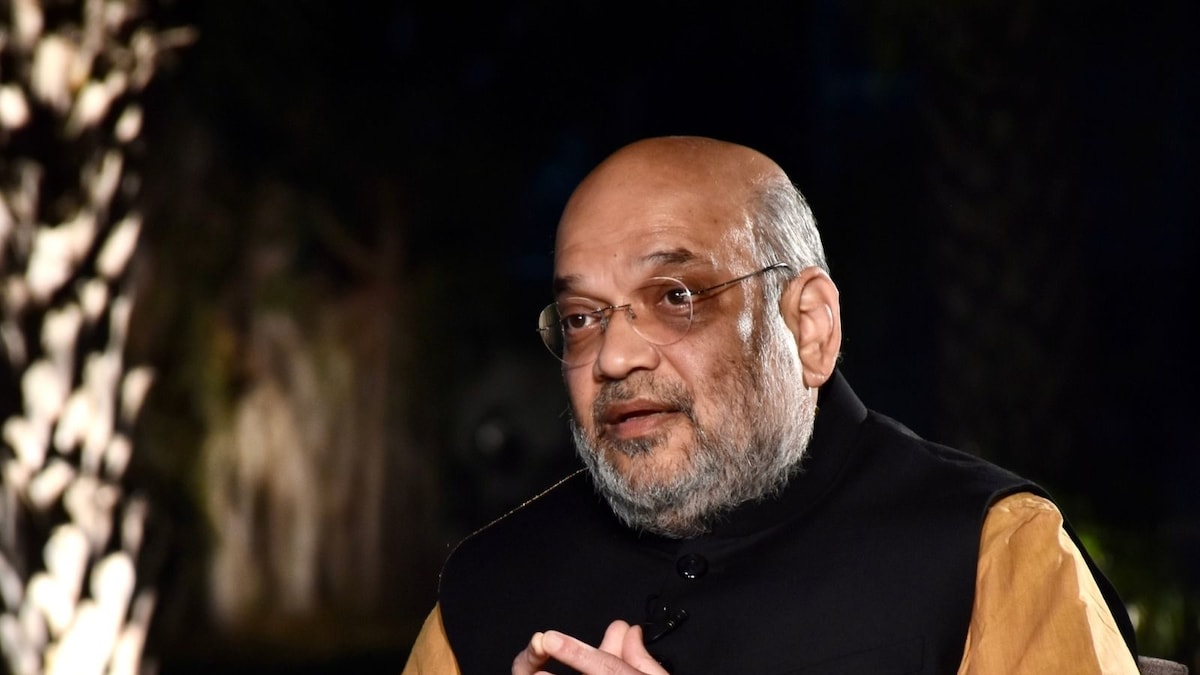 Amit Shah Unveils Book Chronicling Journey of SII's Covishield from Lab to People