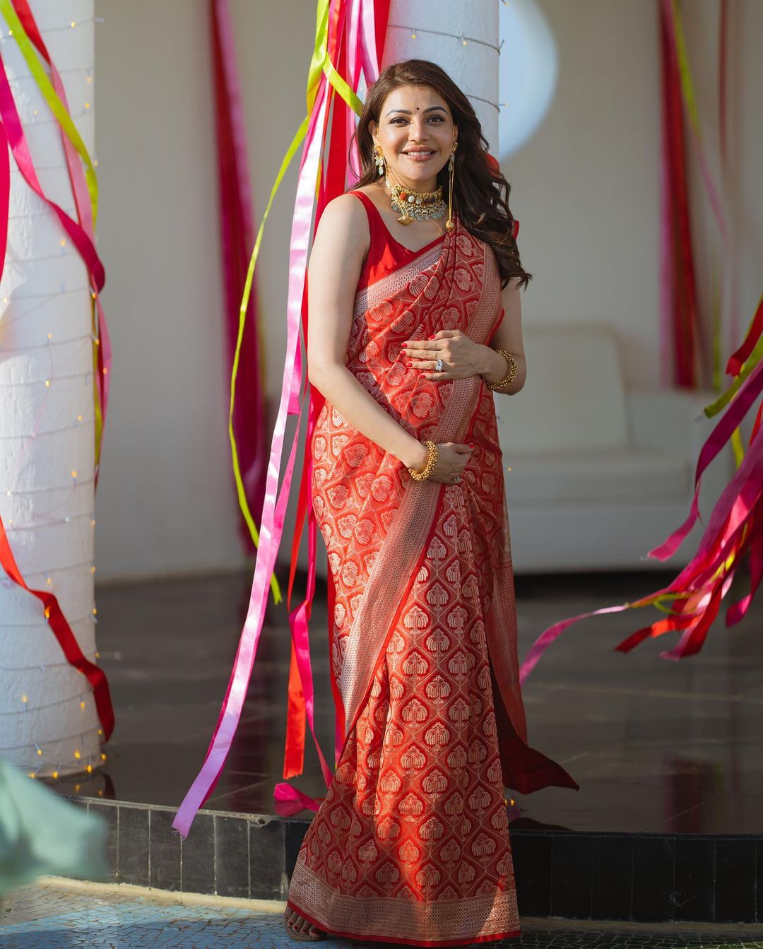 Kajal Aggarwal Flaunts Baby Bump Dressed In Gorgeous Red Saree ...