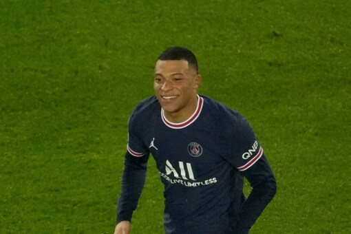 Kylian Mbappe celebrates after scoring his side's opening goal during the Champions League match between PSG and Real Madrid (AP Photo)