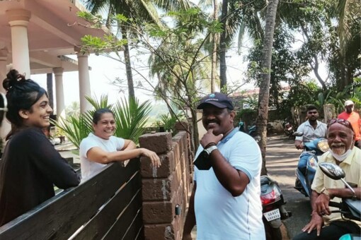 Michael Lobo meets locals from Calangute as part of his door-to-door campaign. (News18).