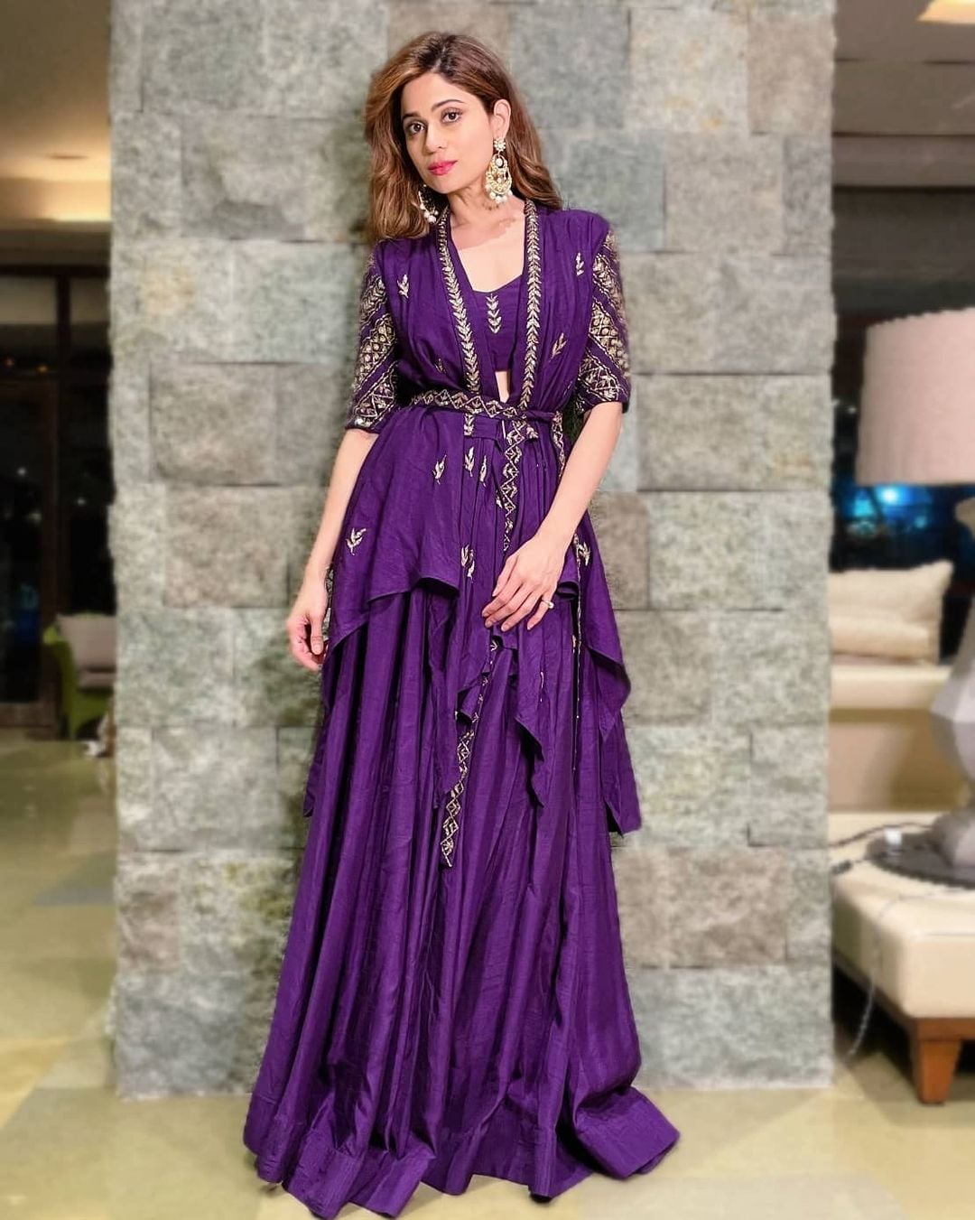 Shamita Shetty looks breathtaking in the purple lehenga. 