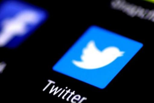 Twitter will let users flag their Tweets before posting. This will put the content behind a warning. (Image Credit: Reuters)