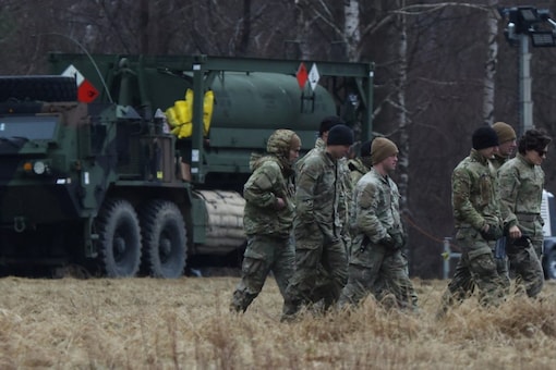 US Army soldiers from the 82nd Airborne Division, deployed to Poland to reassure NATO allies are seen at an airbase, near Arlamow Poland. (Reuters)

