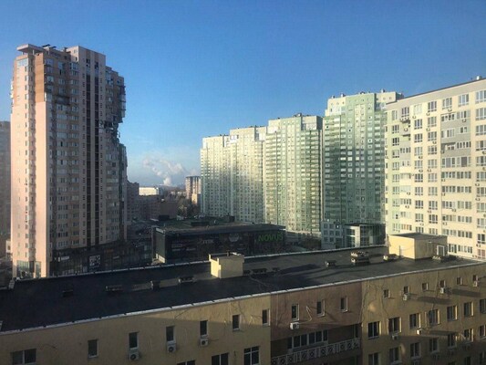 Kyiv apartment block hit by missile: emergency services: SEE PIC Kyiv apartment block hit by missile: emergency services: SEE PIC