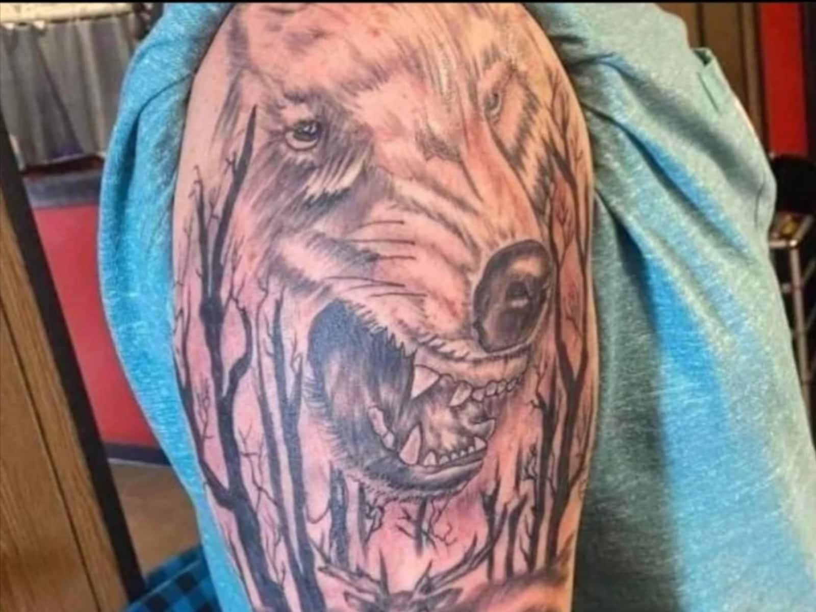 Bear And Wolf Tattoo Design On Wrist  Bear tattoo designs Tattoos Bear  tattoos