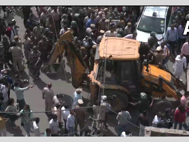 Bulldozer at the Jahangirpuri area of Delhi which witnessed violence on April 16 during a religious procession during an anti-encroachment drive.(Credits: ANI)